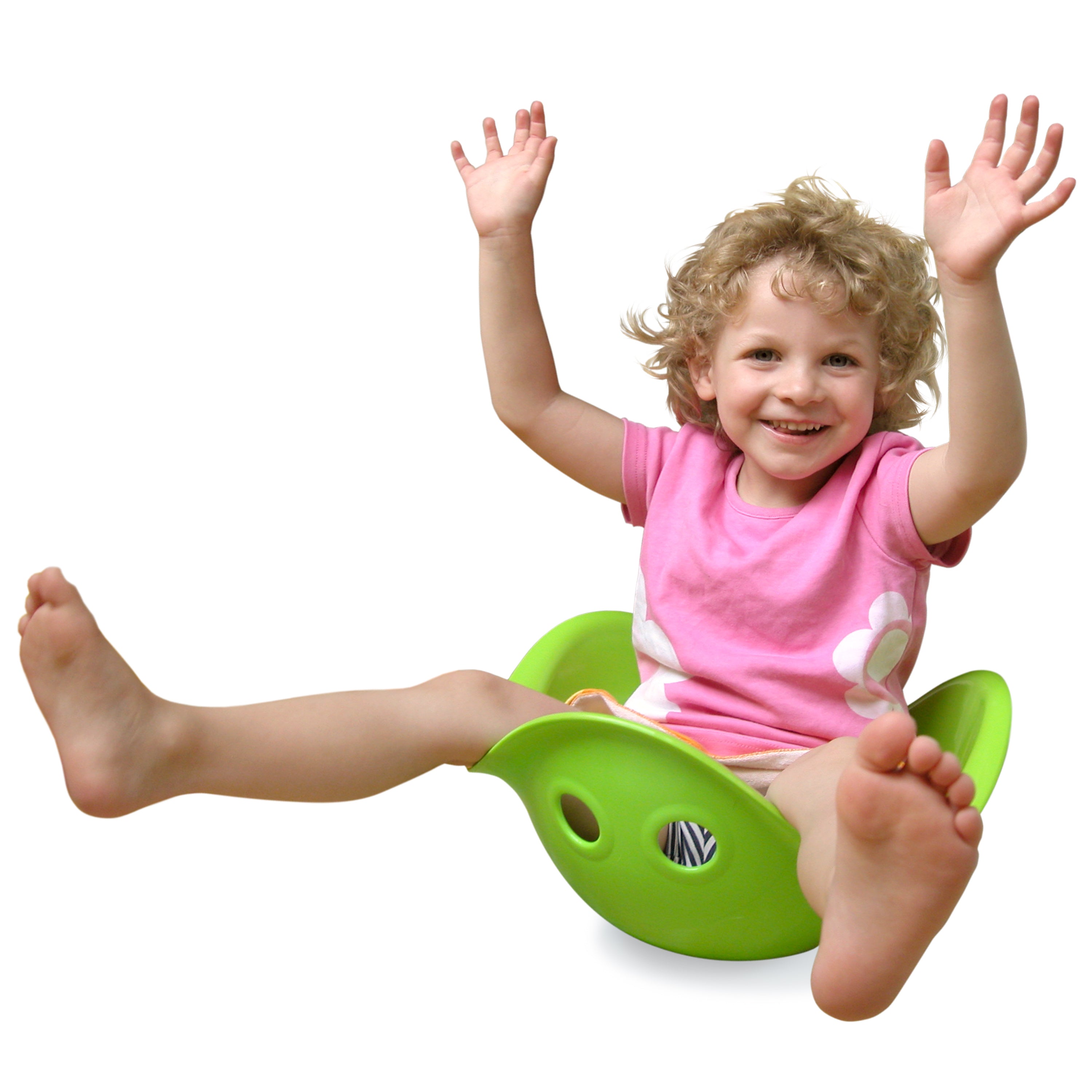 Child sitting in a green Bilibo wobble seat, balancing with arms and feet in the air, training balance and motor skills.