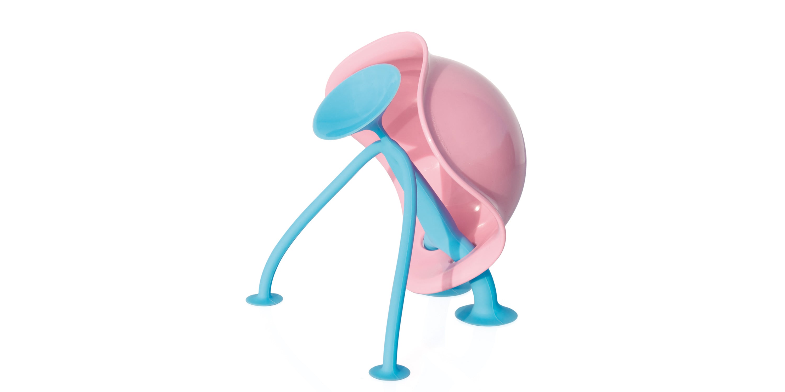A blue Oogi suction cup figure turned into a turtle by adding a pink Bilibo Mini shell, showing how MOLUK toys can be combined to create new adventures.