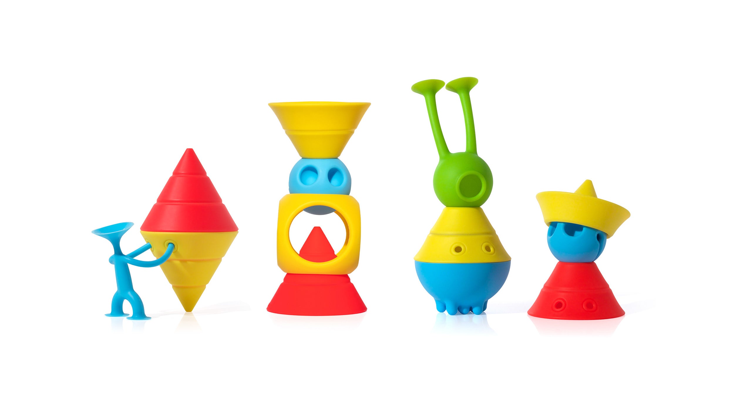 Imaginative characters built by children using MOLUK toys – Oogi figure combined with Hix cones, Mox balls, and Oibo cubes in bright red, yellow, blue, and green.