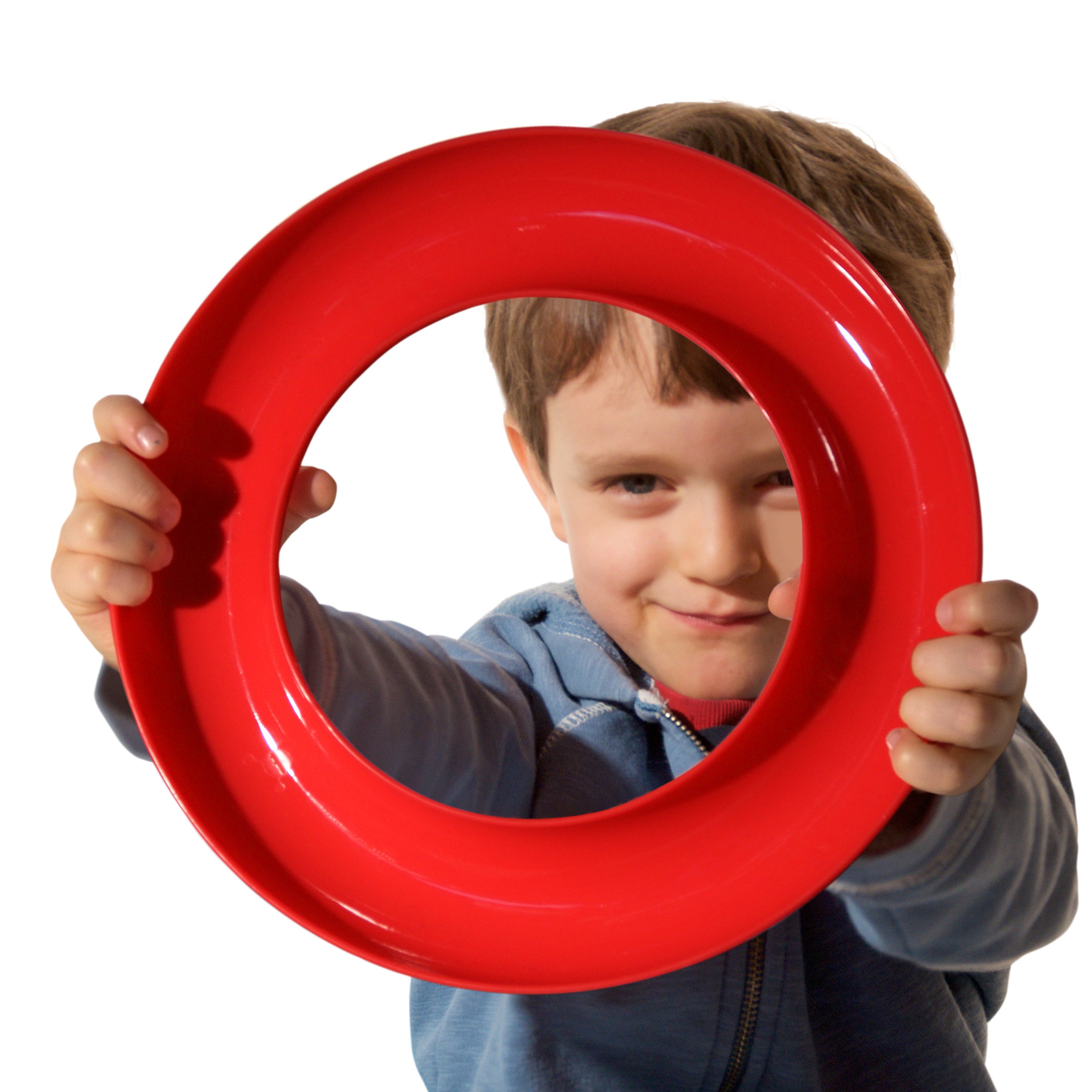 Child holding up a red Nello ring toy from MOLUK, using it as a steering wheel in pretend play.