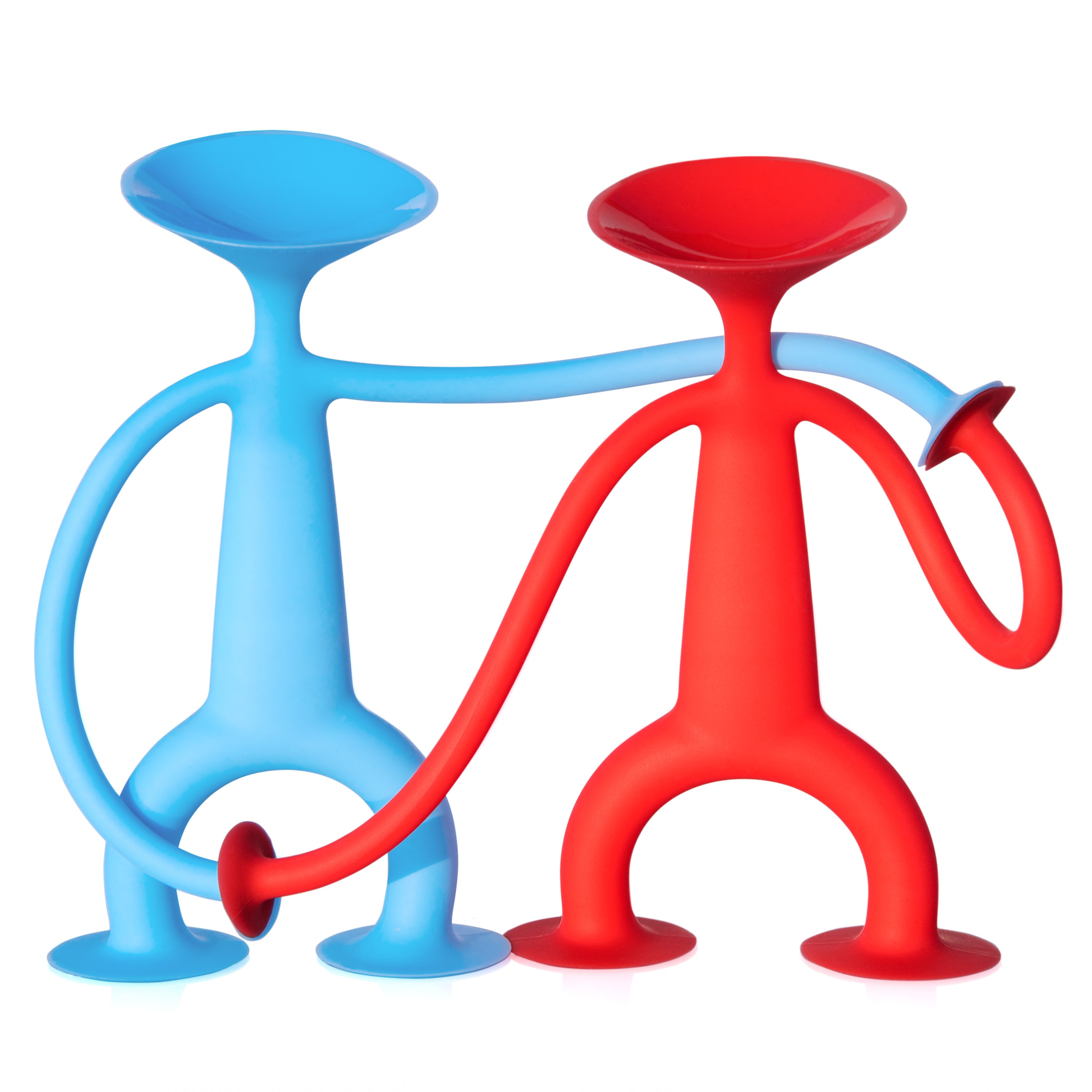 A pair of red and blue Oogi suction cup silicone figures by MOLUK holding hands.