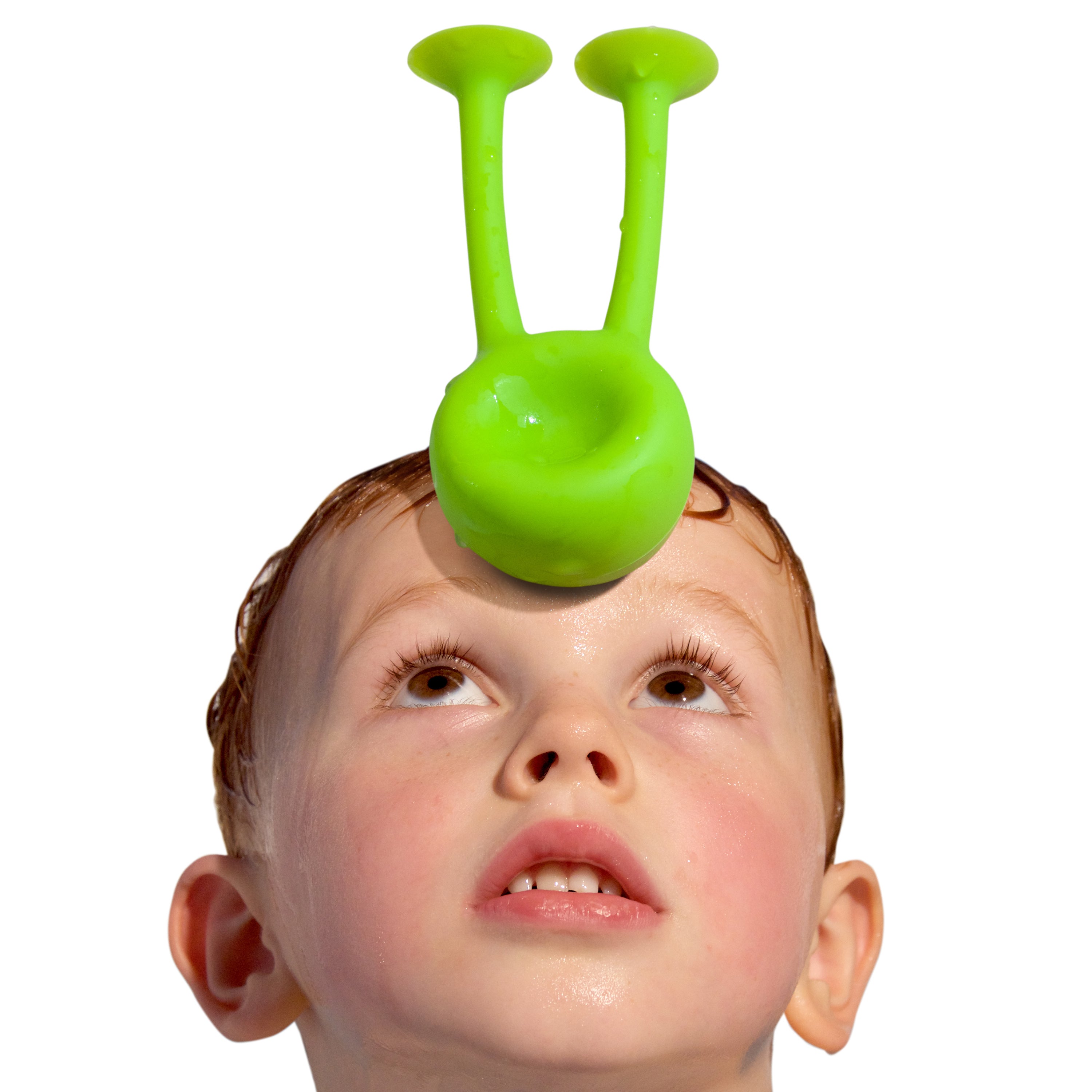 Child with green Oogi Bongo suction cup toy sticking and balancing on its head.