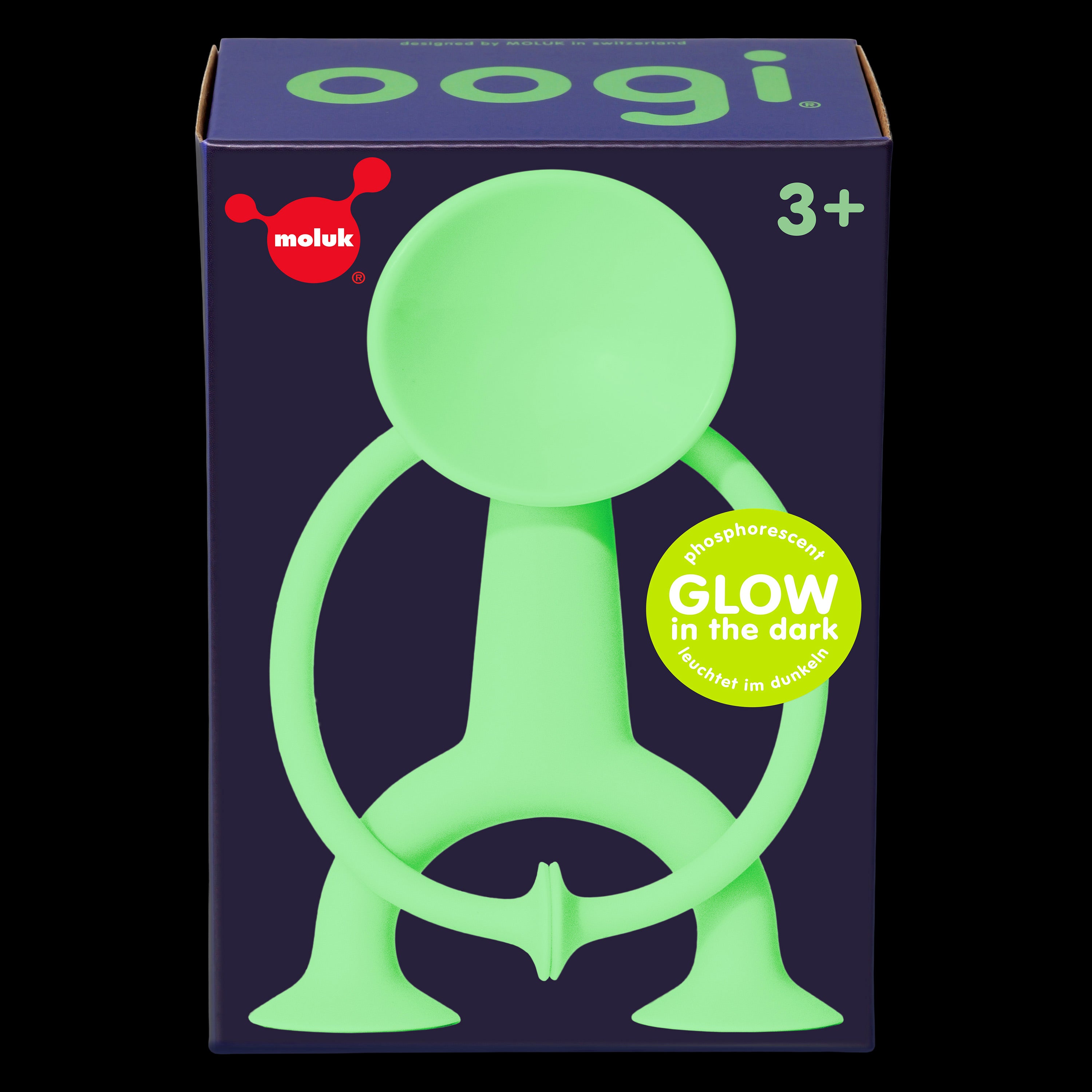 Gift box of Oogi GLOW by MOLUK, a light green silicone suction cup figure that glows in the dark for ages 3 and up.