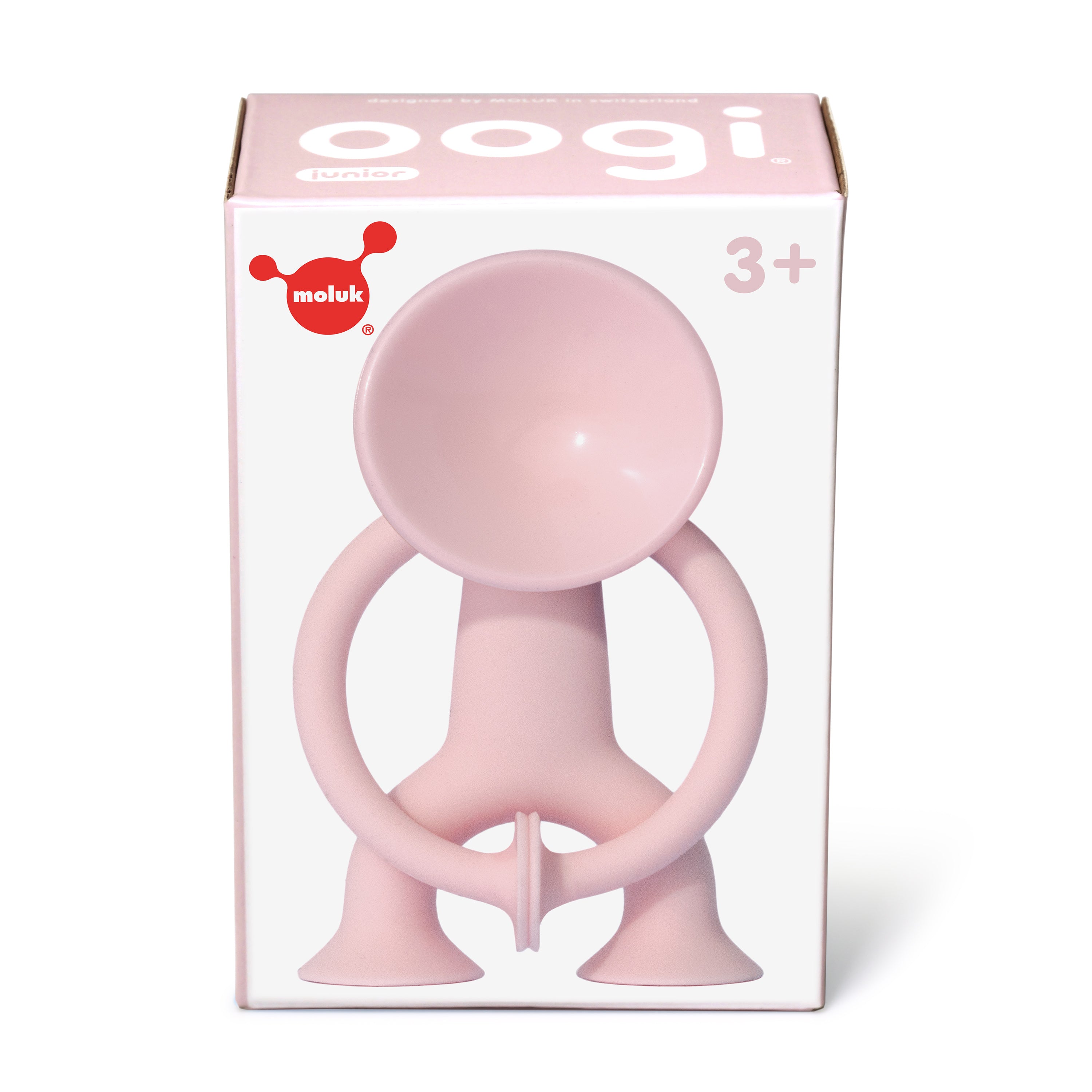 Gift box of baby pink Oogi Junior by MOLUK, a pocket-sized silicone suction cup figure for children ages 3 and up.