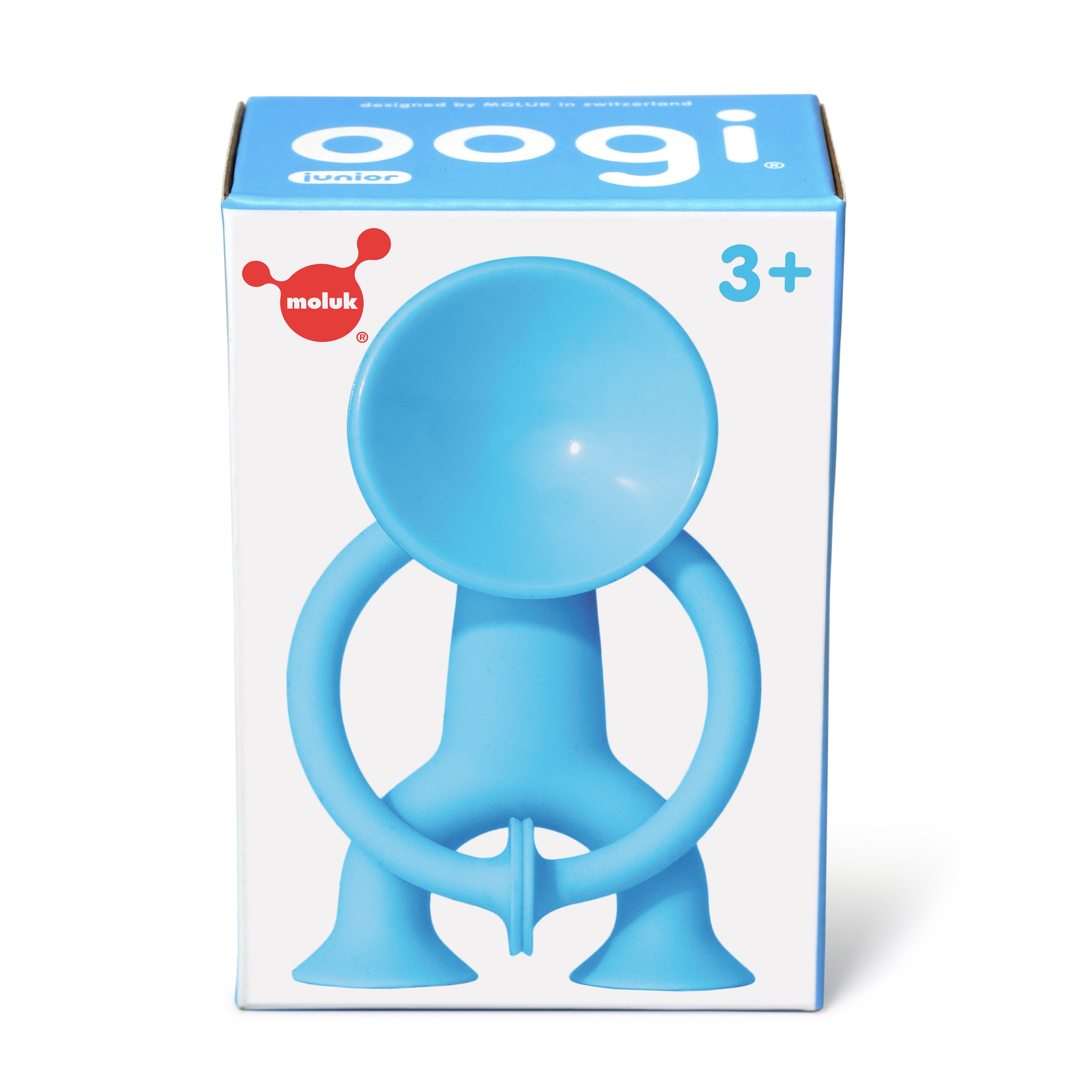 Gift box of blue Oogi Junior by MOLUK, a pocket-sized silicone suction cup figure for children ages 3 and up.