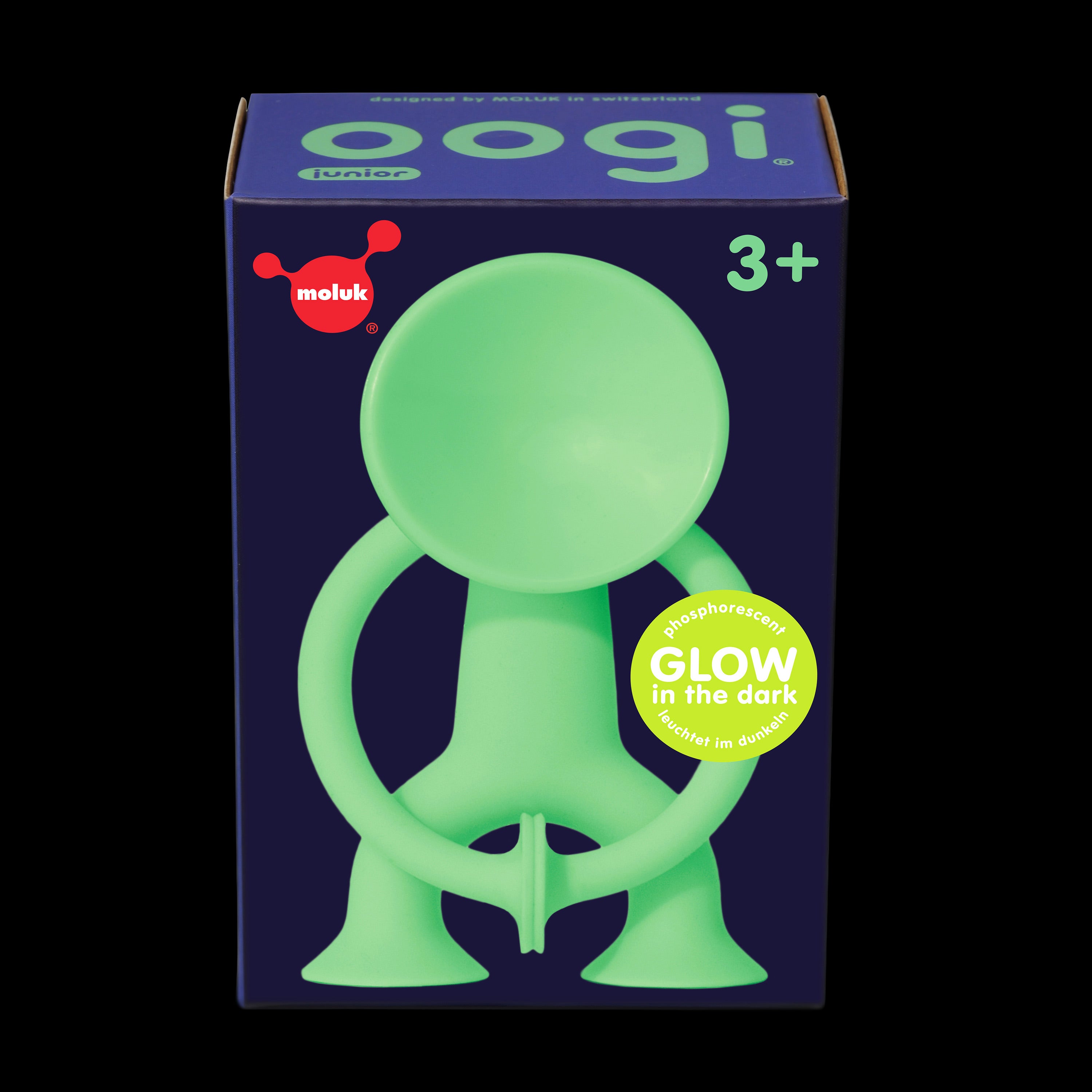 Gift box of Oogi Junior GLOW by MOLUK, a light green silicone suction cup figure that glows in the dark for ages 3 and up.
