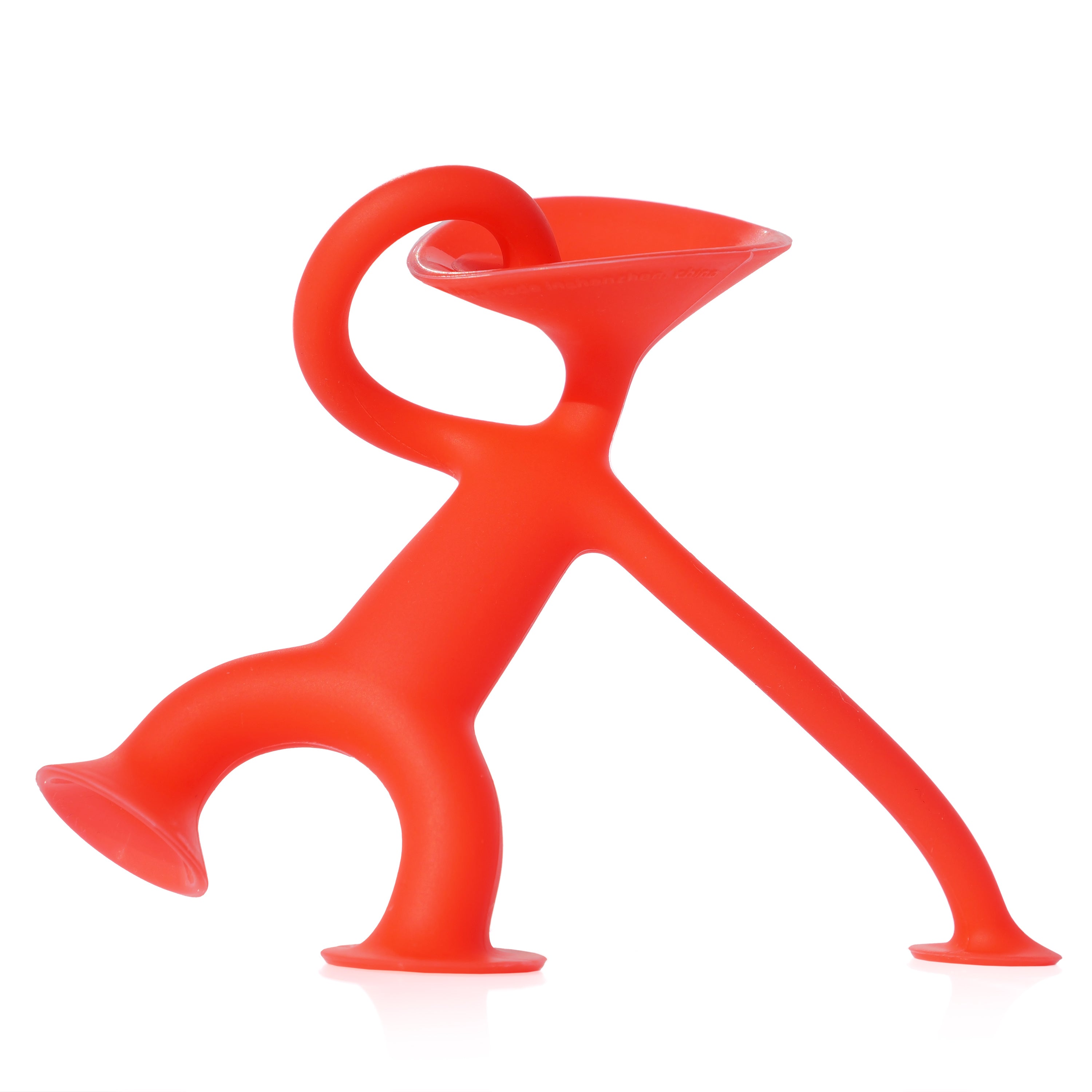 Red Oogi Junior by MOLUK, a pocket-sized silicone figure with suction cup head, hands, and feet for expressive play.