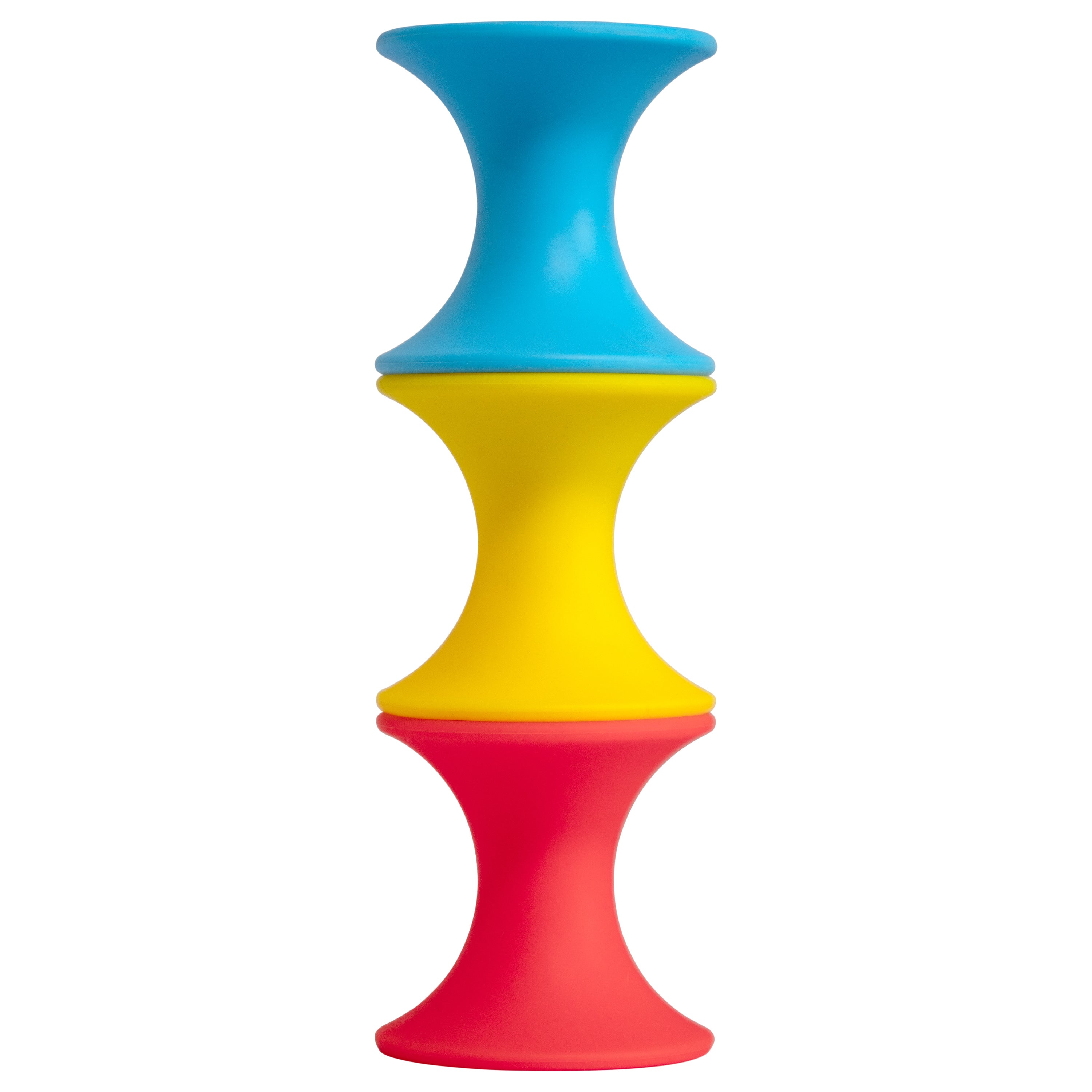 Tulu building blocks by MOLUK in red, blue, and yellow silicone, stacked in a vertical tower.