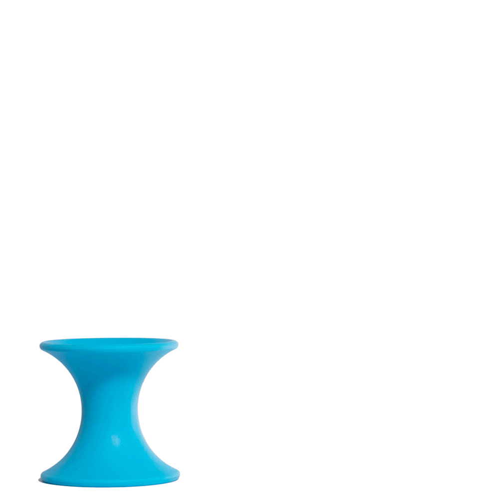 Animation of Tulu silicone building blocks by MOLUK in bright primary colors, stacking and nesting to form a creative pyramid.
