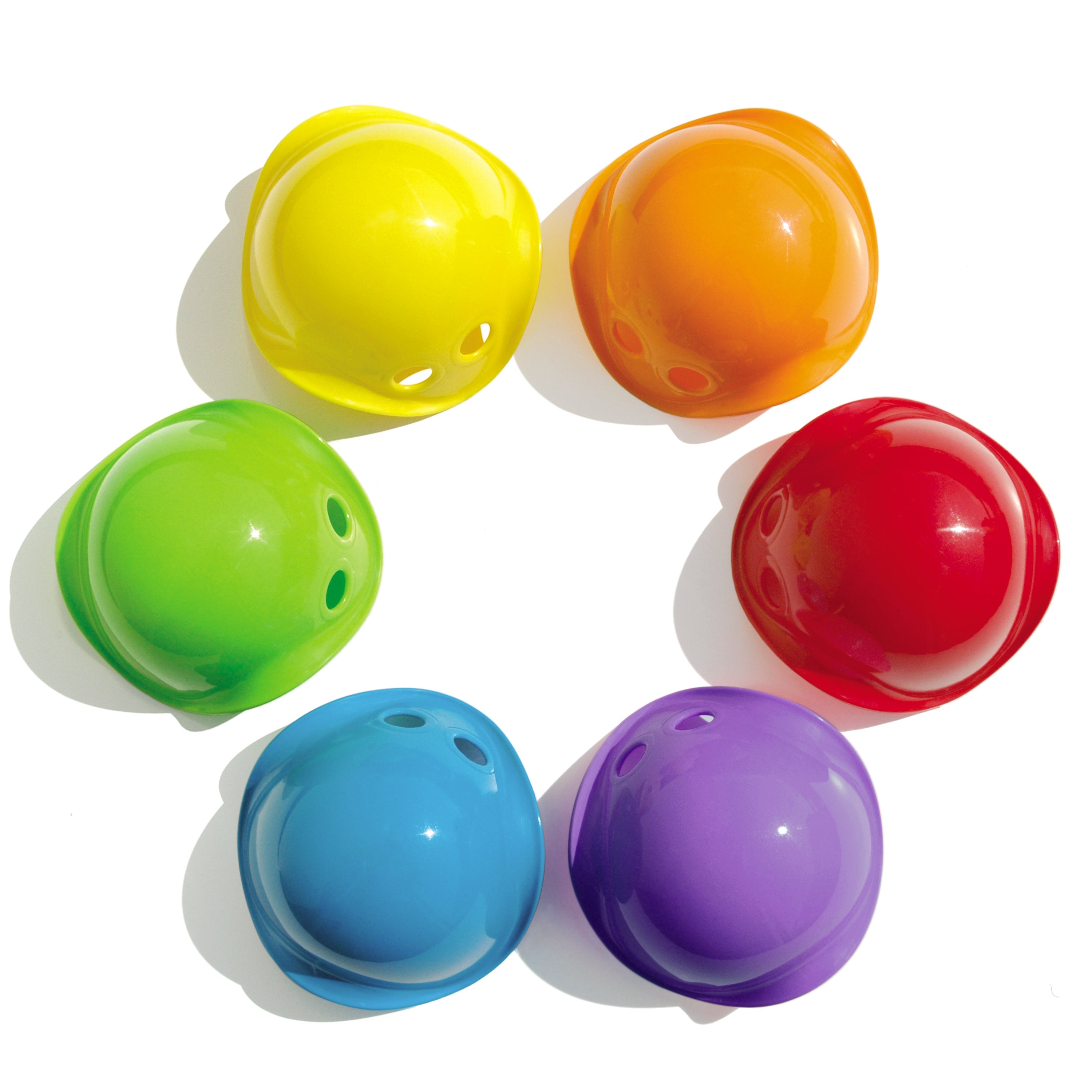 Six Bilibo Mini open-ended play cups by MOLUK in the colors of the rainbow.