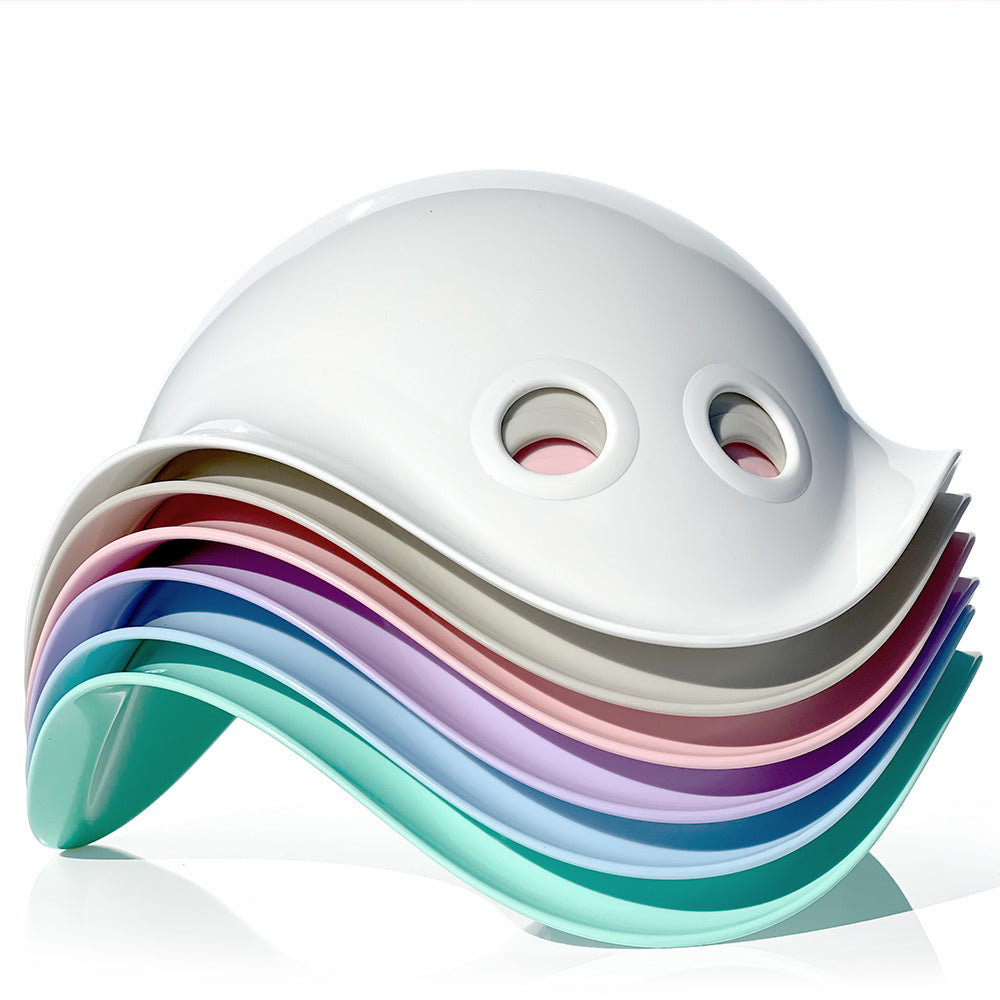 A stack of Bilibo play shells by MOLUK in the new pastel colors launched in 2021.