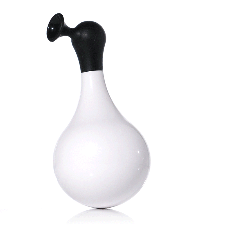 Black and white self-righting Boi wobble and bath toy by MOLUK shown rocking back and forth.