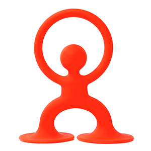 Red Noogi silicone baby teething and grasping toy with large suction cup feet waving with its arms.