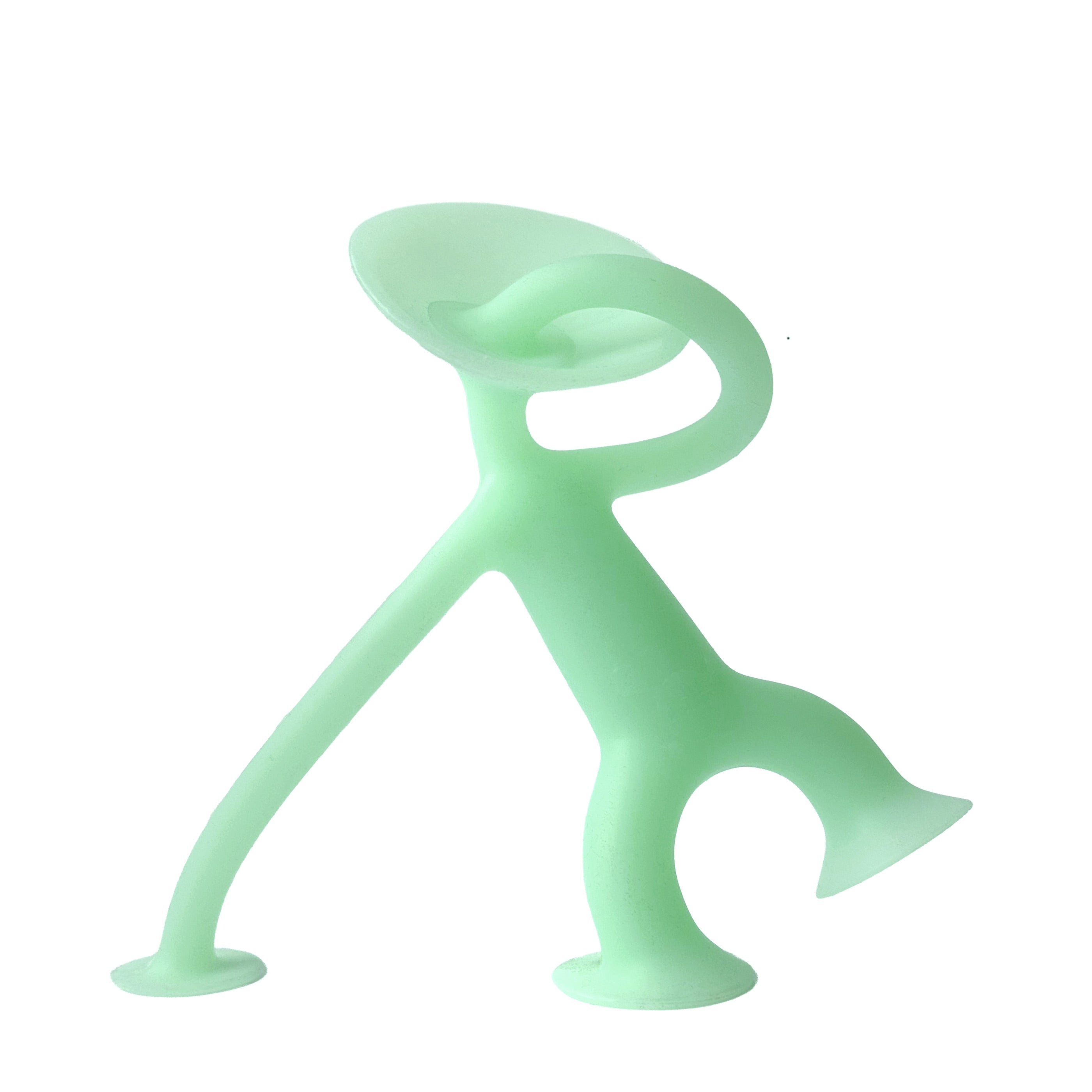 Oogi Junior GLOW by MOLUK, a pocket-sized suction cup fidget figure, shown in daylight.