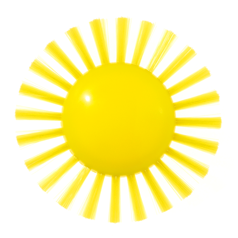 Pluï Brush Sunny by MOLUK, a yellow sun-shaped sensory brush with soft bristles, shown rotating from the front.