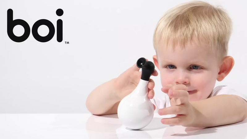 Video showing BOI by MOLUK – a rolling, wobbling sensory toy with a weighted base – bouncing, spinning, and floating in playful motion.