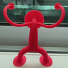 Video showing Oogi silicone suction cup figures by MOLUK sticking to windows while traveling by airplane, bus, car, or train.