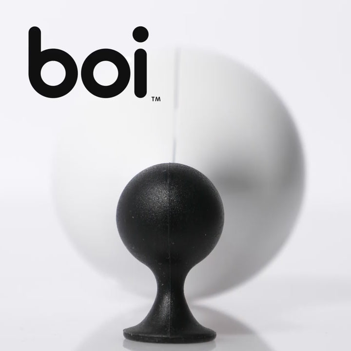 Video showing BOI by MOLUK – a rolling, wobbling sensory toy with a weighted base – bouncing, spinning, and floating in playful motion.