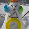 MOLUK’s colorful open-ended toys shown outdoors in winter with kids using them as sleds, snow molds, and sensory bins.