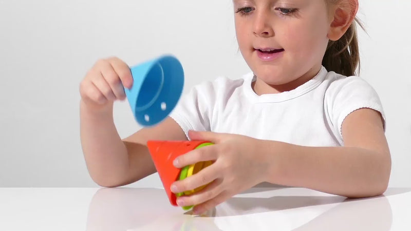 Video of children playing with Hix silicone cones by MOLUK, folding and transforming them into different geometric shapes for stacking, building and imaginative play.